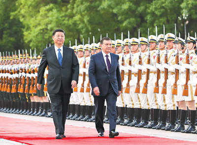 习近平同乌兹别克斯坦总统米尔济约耶夫会谈
